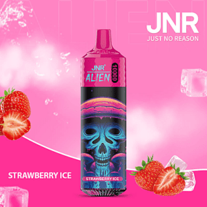 Vape JNR Alien rose avec design de crâne, saveur Strawberry Ice, et texte "JNR Just No Reason" en arrière-plan. Présence de fraises et de glaçons.