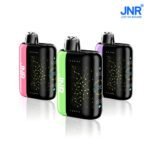 Three JNR PLUS-X disposable vapes in pink, green, and purple color accents, showcasing futuristic design and advanced features on a white background