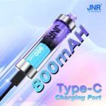 JNR Crystal Glow vape device showing internal 800mAh battery connected to a Type-C charging cable on a gradient blue and pink background