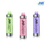 Three JNR Crystal Glow disposable vape devices in green, pink, and purple colors representing Strawberry Watermelon Ice, Watermelon Ice, and Mixed Berries flavors